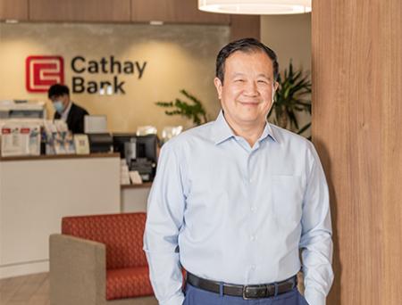 Chang M. Liu, the CEO and President of Cathay Bank, poses for a professional headshot.