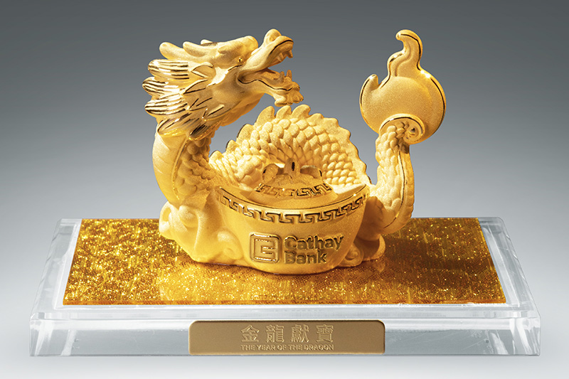 Cathay Bank’s gold-plated lucky dragon figurine is the 2024 lunar new year collectible.