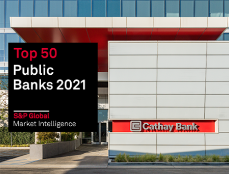 Top 50 Public Banks by S&amp;P Global Market logo sits on the image of the Cathay Bank headquarters building in El Monte, California 