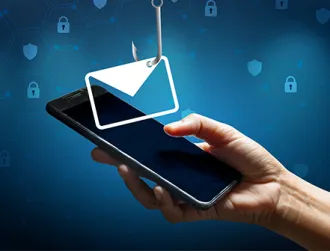 A person gets a bank notice warning against scams by text and email on their mobile device.