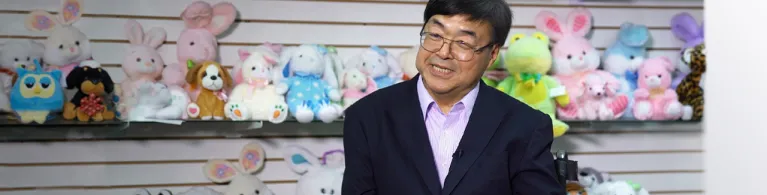 Megatoys CEO Charlie Woo accepting an interview in his office. 
