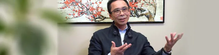 Canton Food’s CEO & President Cho W. Kwan accepting an interview in his office. 