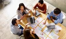 Multiethnic business team meeting in office.