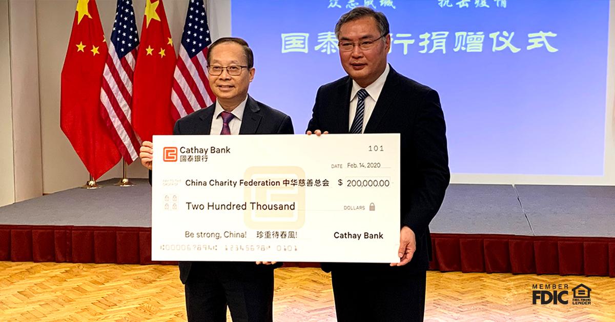 Pin Tai (left), Chief Executive Officer of Cathay Bank, presented donation check to Zhang Ping (right), the Consul General of the Consulate General of the People's Republic of China in Los Angeles, in support of the coronavirus control efforts in China.