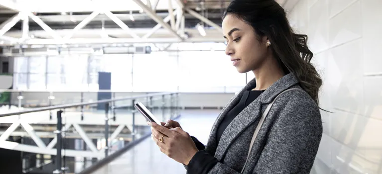 Young businesswoman using smart phone